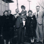 Family photo; Eddie right with crutches